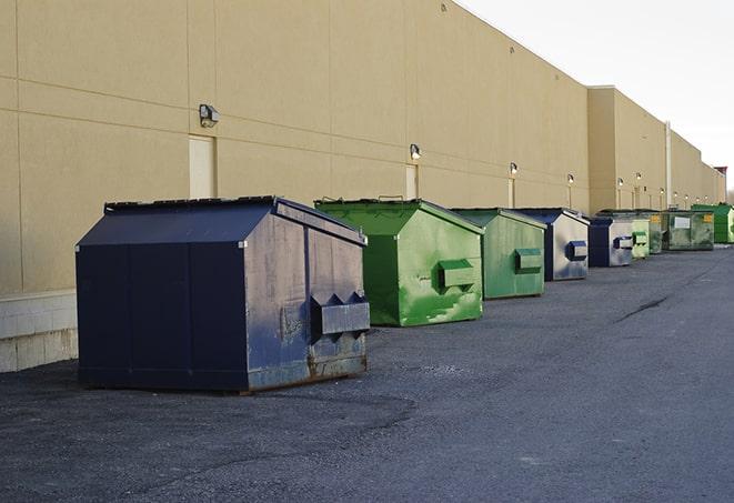 a row of large construction dumpsters on-site in Brandywine MD